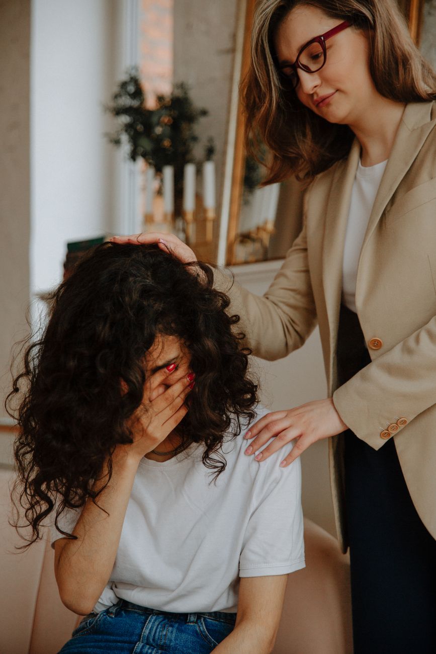 therapist comforting patient